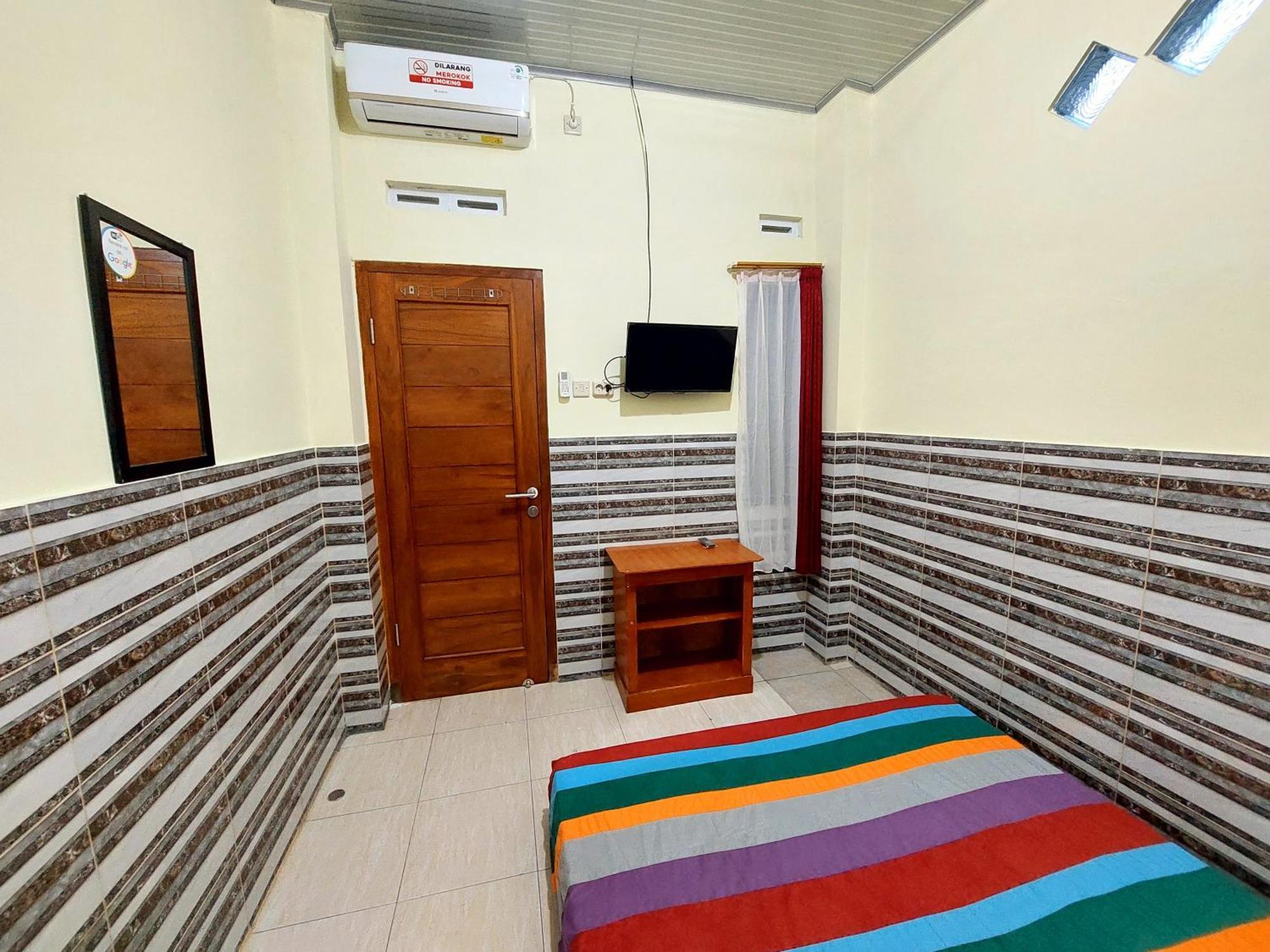 Griya Tugu Jogja Syariah Hotell Yogyakarta Rom bilde